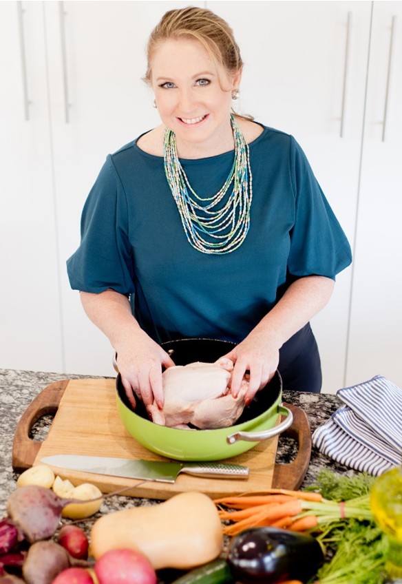 Renee Bailey Over 50's Health preparing a chicken